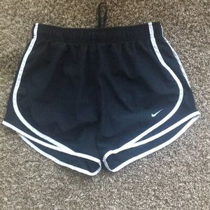 Black and white Nike running shorts